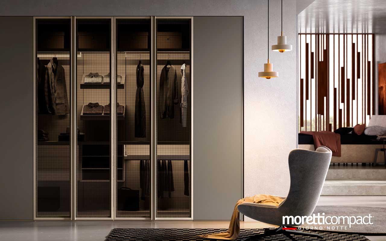 Portale a “raccordi” per chiusura in nicchia con ante soffietto