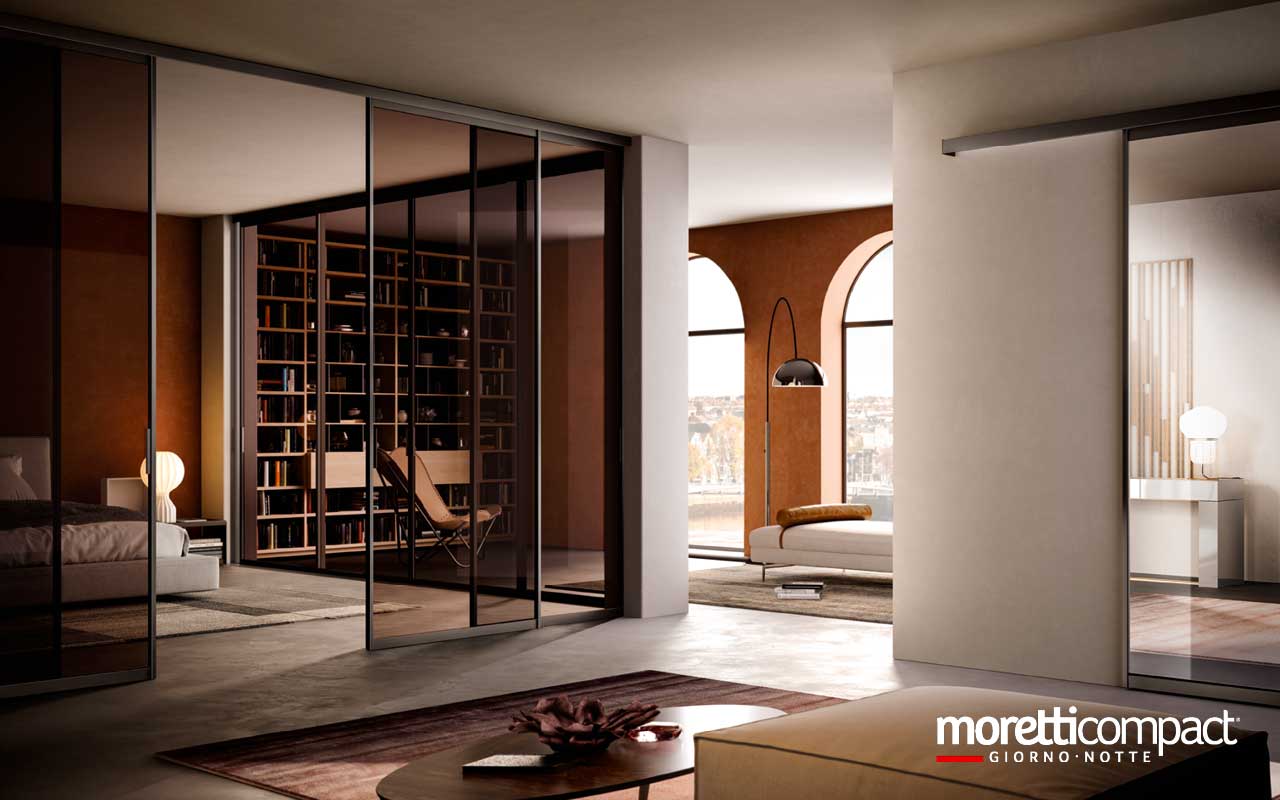 Portale ad ante scorrevoli vetro con binari a soffitto