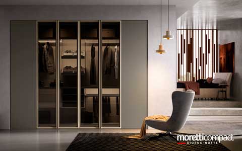 Portale a “raccordi” per chiusura in nicchia con ante soffietto